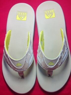 Reef Fanning Flip Flops in Beige with Bright Yellow Accents